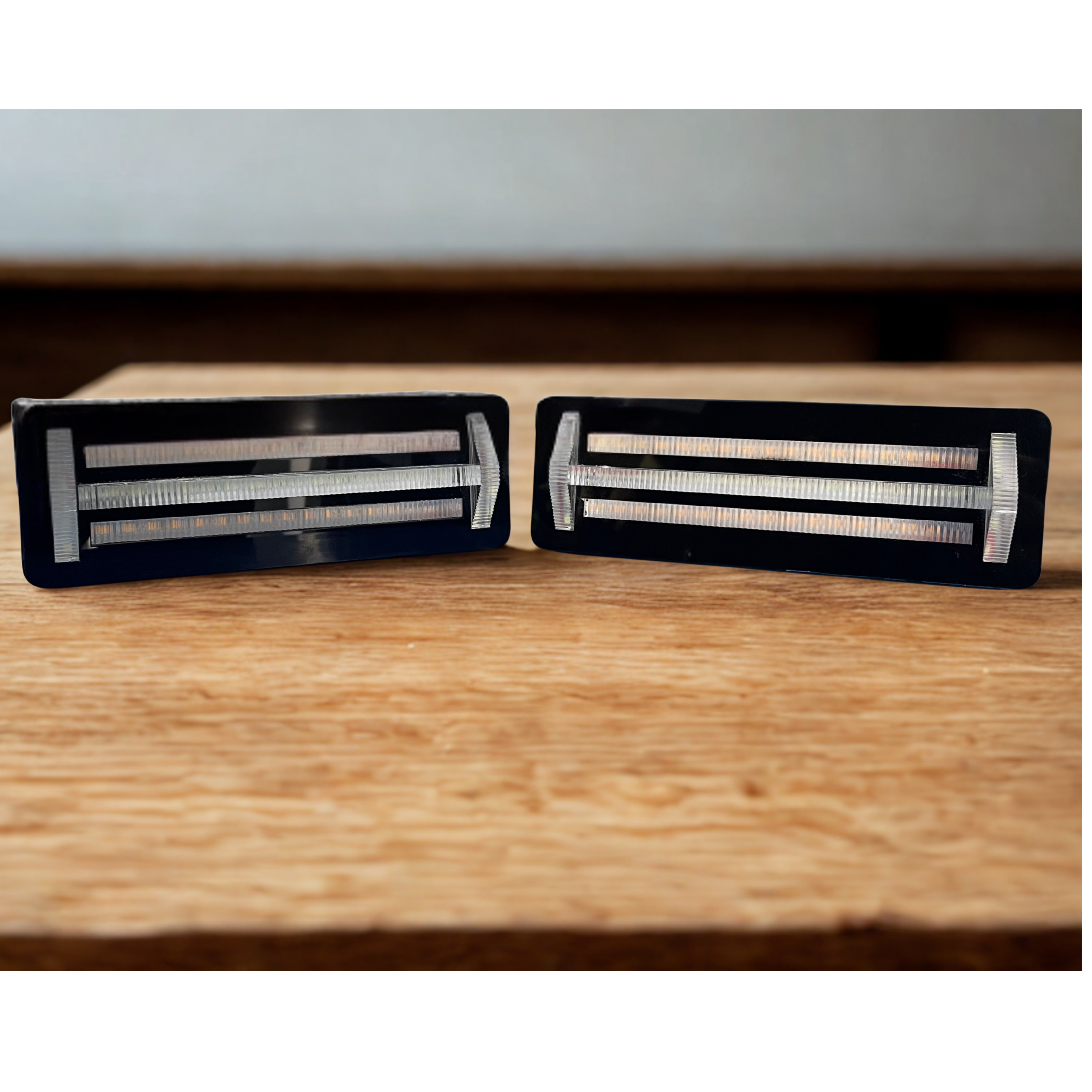 Pair of front DRL  for Thar Rectangular on a wooden surface

